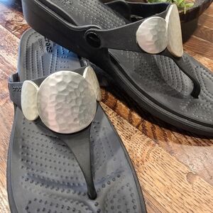 Crocs Ladies, dual Comfort Black Flip Flop Sandals with Silver Discs